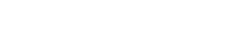 A green sign with the word "FLAGSHIP" in large white letters and the word "CARROLLTON" in smaller white letters below it.